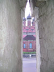 Вид из бойницы монастыря на Богоявленскую церковь XVII века