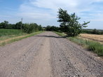 А потом была дорога длиною в 2 километра, посыпанная гравием. И выводила дорога на трассу...