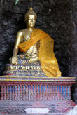 Статуэтка Будды у основания Золотой горы