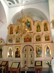 Иконостас Троицкого собора, где есть изображения Святой Троицы и преподобного Сергия Радонежского