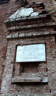 От нее остались практически одни руины, а, меж тем, именно тут был крещен Александр Грин и об этом пока еще имеется табличка на фасаде церкви.