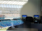 Два кадра в одном (отражение стадиона в стекле)
