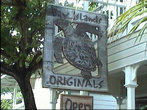 Реклама магазина сувениров на  острове Утила.