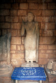 Стоящий Будда в храме