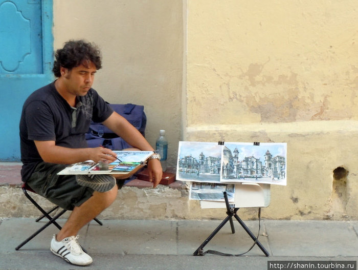 Художник за работой на улице Куба