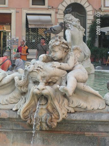 Ангелочек и голова Рим, Италия