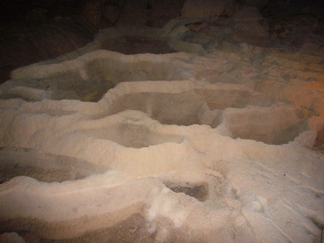 Солевые натеки на дне пещеры.